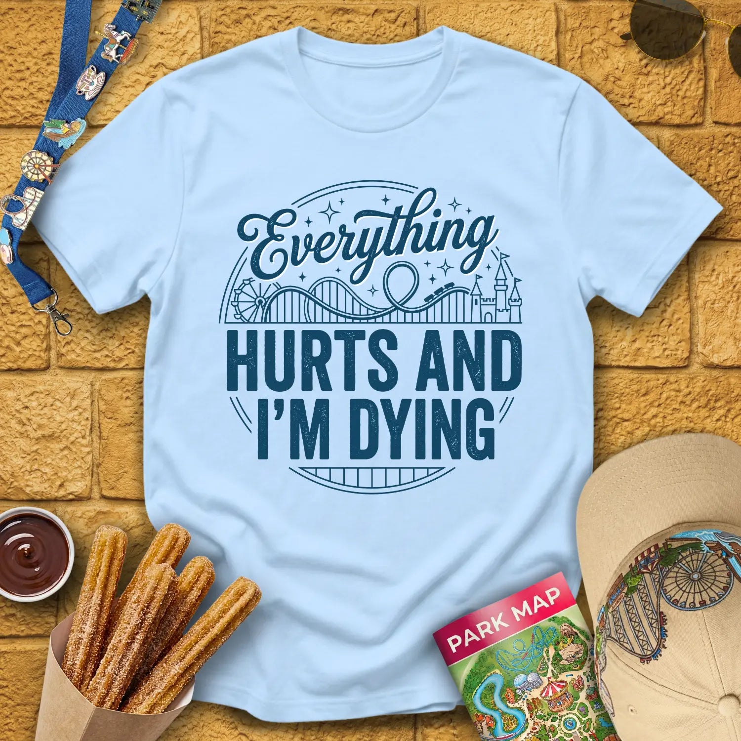 Everything Hurts [Badge] T-Shirt for Theme Park Fans (Light Blue)