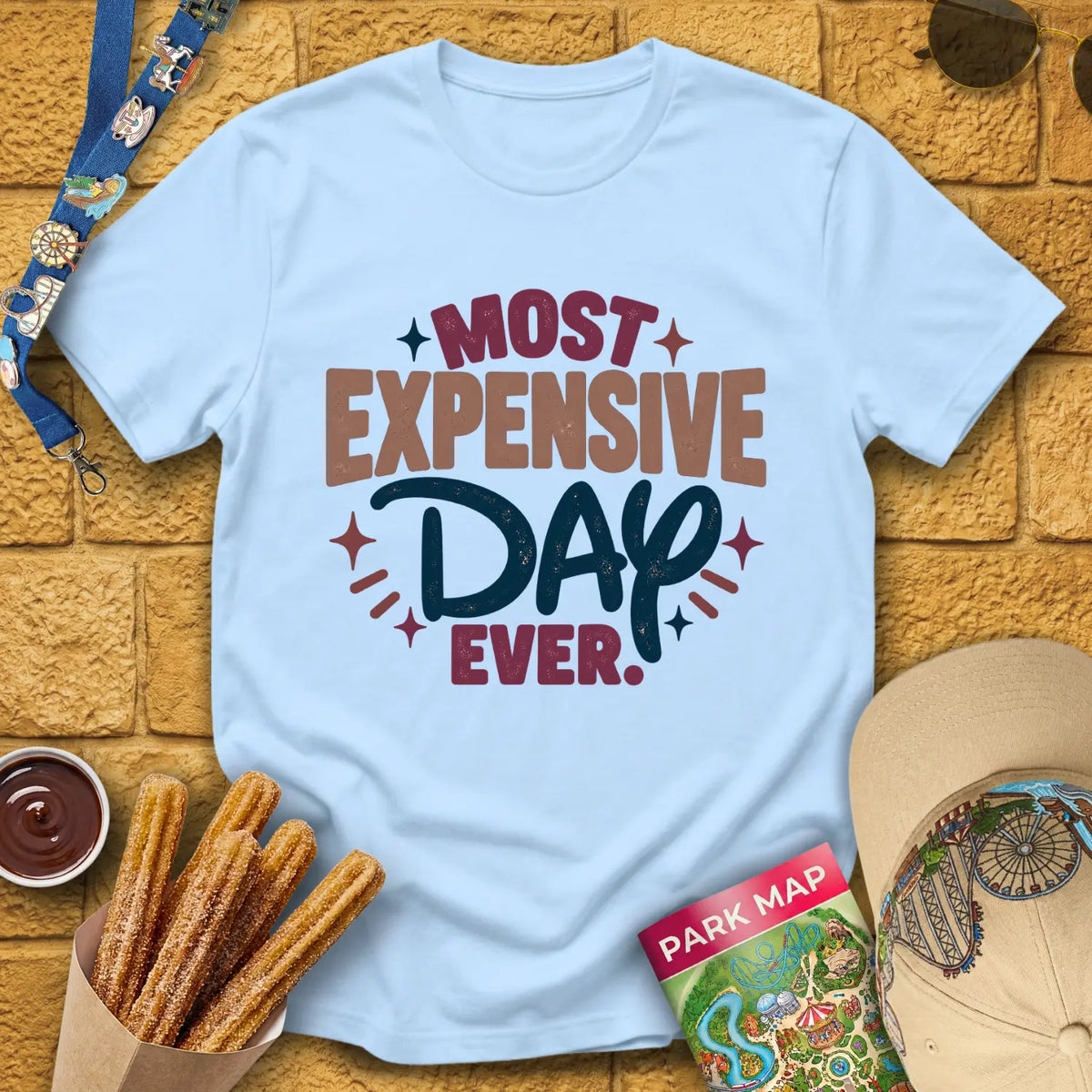 Most Expensive Day [Bold] T-Shirt for Theme Park Fans (Light Blue)