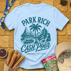 Park Rich Cash Poor [RetroBrush] T-Shirt for Theme Park Fans (Light Blue)