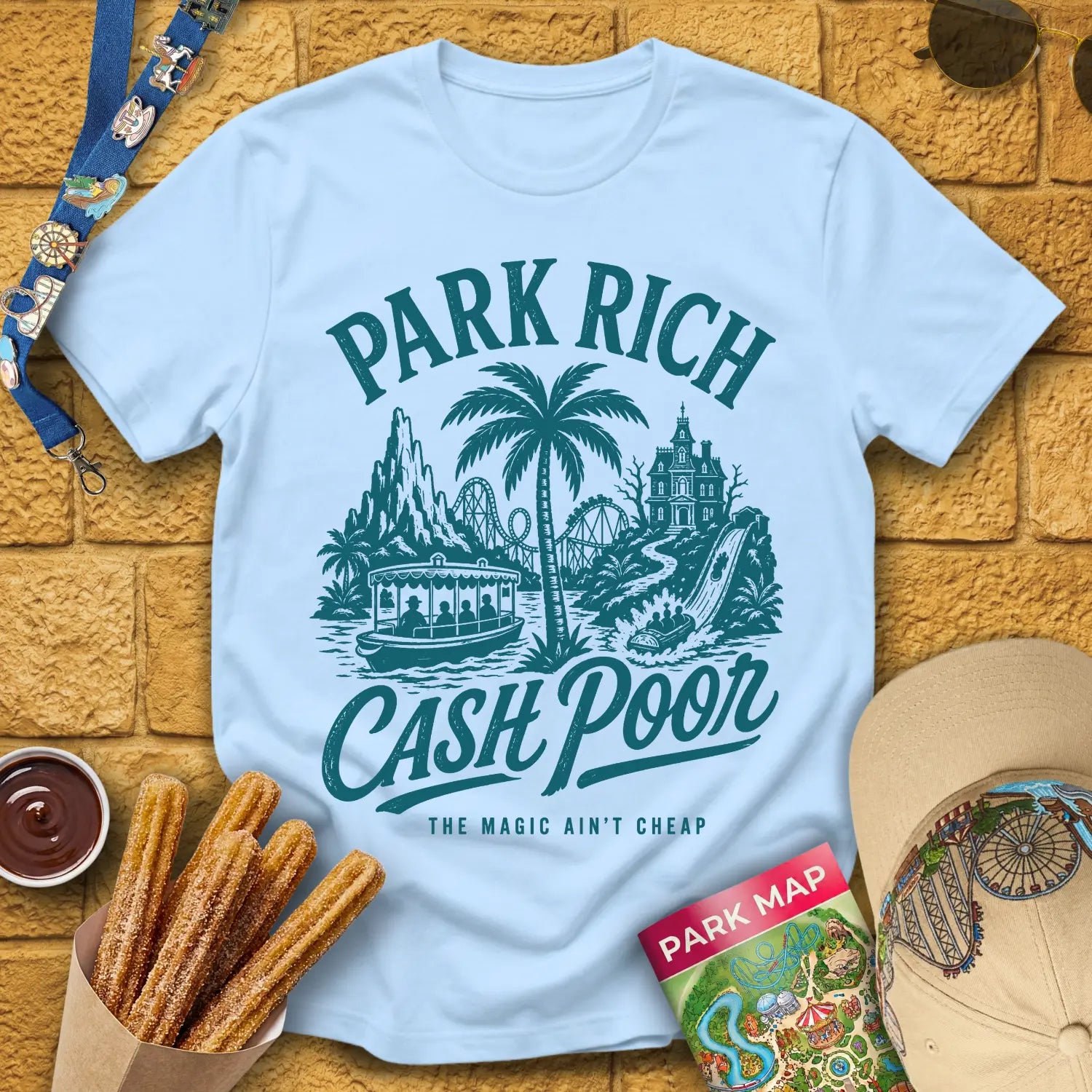 Park Rich Cash Poor [RetroBrush] T-Shirt for Theme Park Fans (Light Blue)