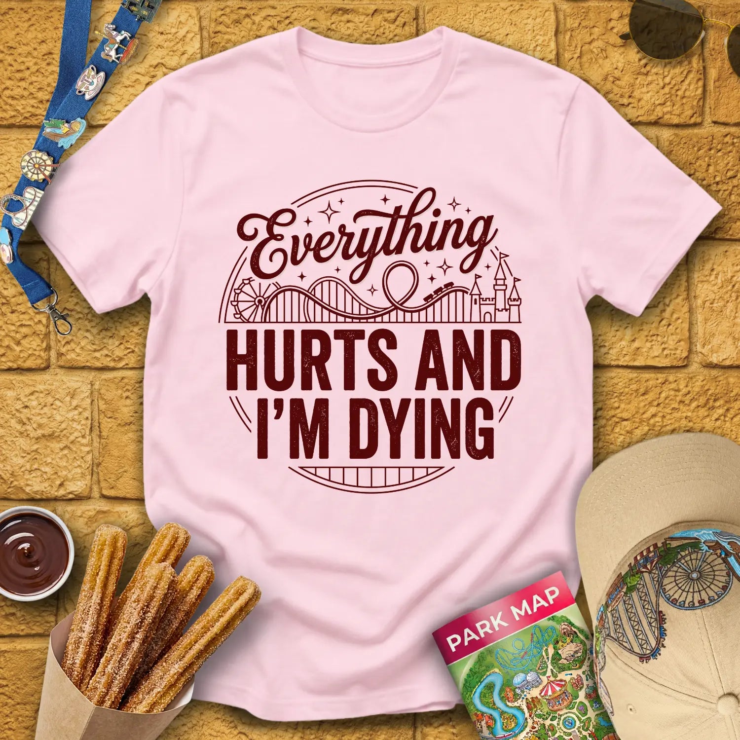 Everything Hurts [Badge] T-Shirt for Theme Park Fans (Light Pink)
